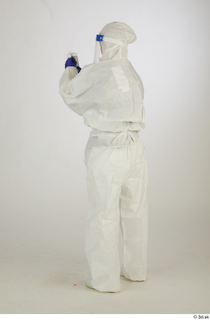  Photos Daya Jones Nurse in Protective Suit Pose preparing test samples standing whole body 0004.jpg